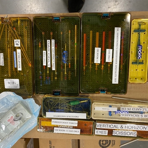 Pallet of Surgical Sterilization Boxes and Some Instruments