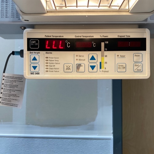 GE Healthcare 3400 Infant Warmer System with Light and scale.